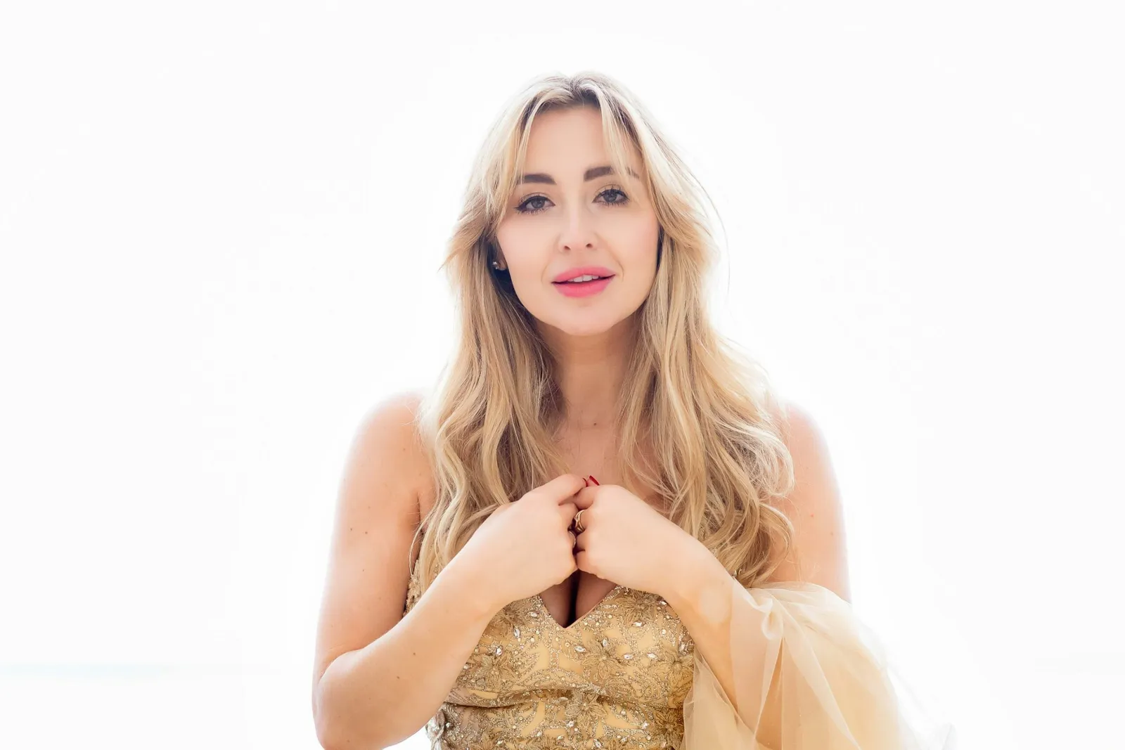 Venicia Rasmussen, soprano, in gold dress