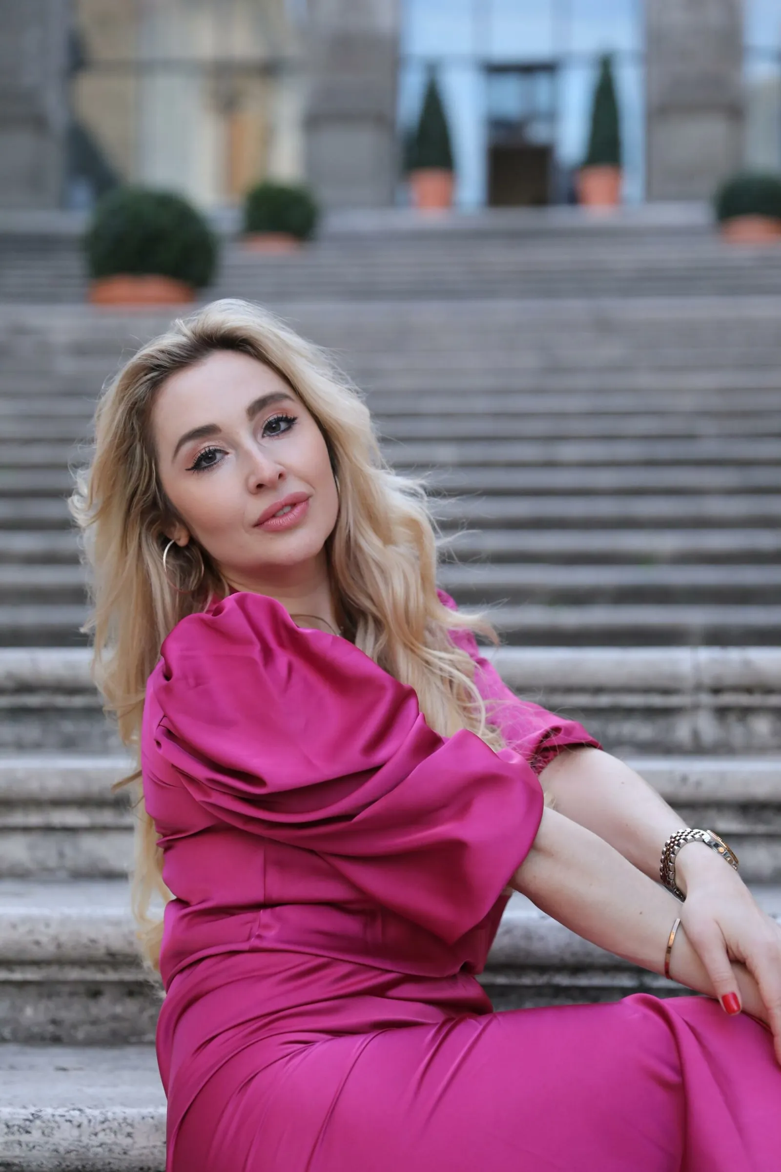 Venicia Rasmussen in pink gown on Rome steps